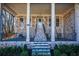 White columns and brick detail on this charming front porch at 1496 Sweet Bottom Sw Cir, Marietta, GA 30064