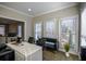 Sunlit home office featuring a large desk and comfortable chair at 1496 Sweet Bottom Sw Cir, Marietta, GA 30064