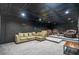 Basement home theater with tiered seating and dark decor at 1496 Sweet Bottom Sw Cir, Marietta, GA 30064