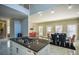 Spacious kitchen featuring an island with gas cooktop and a view into the dining area at 1496 Sweet Bottom Sw Cir, Marietta, GA 30064