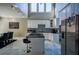 Modern kitchen with white cabinets, marble floors, and stainless steel appliances at 1496 Sweet Bottom Sw Cir, Marietta, GA 30064