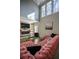 Bright living room with a sectional sofa and high ceilings at 1496 Sweet Bottom Sw Cir, Marietta, GA 30064
