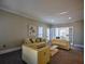 Spacious living room with elegant furniture and ample natural light at 1496 Sweet Bottom Sw Cir, Marietta, GA 30064