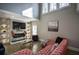 Two-story living room with a sectional sofa and built-in shelving at 1496 Sweet Bottom Sw Cir, Marietta, GA 30064