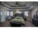 Luxurious main bedroom with high ceilings and a ceiling fan at 1496 Sweet Bottom Sw Cir, Marietta, GA 30064