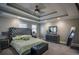 Main bedroom with coffered ceiling, a large bed, and plenty of space at 1496 Sweet Bottom Sw Cir, Marietta, GA 30064