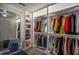 Bright walk-in closet with ample hanging and shelf space at 1496 Sweet Bottom Sw Cir, Marietta, GA 30064