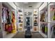 Large walk-in closet with custom shelving and lighting at 1496 Sweet Bottom Sw Cir, Marietta, GA 30064