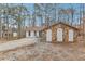 Ranch home with three-car garage and wooded lot at 4476 Post Rd, Winston, GA 30187