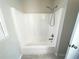Clean bathroom featuring a shower/tub combo at 4620 Cedar Brook Se Dr, Conyers, GA 30094