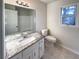 Updated bathroom with granite vanity and tiled flooring at 4620 Cedar Brook Se Dr, Conyers, GA 30094