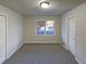 Well-lit bedroom with neutral decor and carpet at 4620 Cedar Brook Se Dr, Conyers, GA 30094