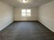 Spacious bedroom with neutral walls and plush carpeting at 4620 Cedar Brook Se Dr, Conyers, GA 30094