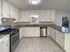 Updated kitchen with granite countertops and stainless steel appliances at 4620 Cedar Brook Se Dr, Conyers, GA 30094