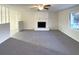 Living room with fireplace and neutral decor at 4620 Cedar Brook Se Dr, Conyers, GA 30094