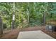 Private backyard with patio and wooded area at 718 Surrey Park Se Pl, Smyrna, GA 30082