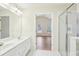 Bathroom with double vanity and access to bedroom at 718 Surrey Park Se Pl, Smyrna, GA 30082