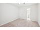 Bright bedroom with plush carpeting and access to a private bathroom at 718 Surrey Park Se Pl, Smyrna, GA 30082