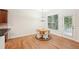 Cozy breakfast nook with hardwood floors and view to backyard at 718 Surrey Park Se Pl, Smyrna, GA 30082