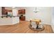 Dining area with hardwood floors and kitchen access at 718 Surrey Park Se Pl, Smyrna, GA 30082