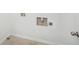 Simple laundry room with tile floor and hookups at 718 Surrey Park Se Pl, Smyrna, GA 30082