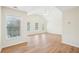 Open living area with hardwood floors and a vaulted ceiling at 718 Surrey Park Se Pl, Smyrna, GA 30082