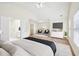 Virtually staged main bedroom with sitting area and ensuite bath at 718 Surrey Park Se Pl, Smyrna, GA 30082