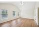 Large main bedroom with hardwood floors and a ceiling fan at 718 Surrey Park Se Pl, Smyrna, GA 30082