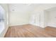 Main bedroom with hardwood floors and ensuite bathroom access at 718 Surrey Park Se Pl, Smyrna, GA 30082