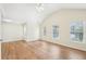 Spacious main bedroom with hardwood floors and vaulted ceiling at 718 Surrey Park Se Pl, Smyrna, GA 30082