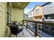 Inviting balcony with outdoor seating offers views of the community's modern architecture at 720 Perch Pl, Atlanta, GA 30312