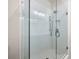 Sleek walk-in shower with subway tile, glass door, and modern fixtures at 720 Perch Pl, Atlanta, GA 30312
