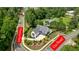 Aerial view of property at Chateau Place and Cox Road, surrounded by lush greenery at 100 Chateau Pl, Woodstock, GA 30188