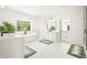 Bright bathroom featuring a soaking tub, dual vanities, and a walk-in shower at 100 Chateau Pl, Woodstock, GA 30188