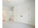 Bedroom with a double-door closet and a view into the ensuite bathroom at 100 Chateau Pl, Woodstock, GA 30188