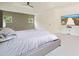 Comfortable main bedroom with modern wall decor and an entertainment center at 100 Chateau Pl, Woodstock, GA 30188