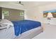 Comfortable main bedroom with modern wall decor and an entertainment center at 100 Chateau Pl, Woodstock, GA 30188