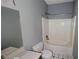 Clean bathroom featuring a bathtub, shower, and updated vanity at 791 Cross Plains Hulett Rd, Carrollton, GA 30116