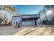 Back exterior view of home with deck and stairs at 791 Cross Plains Hulett Rd, Carrollton, GA 30116