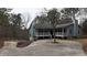 Two-story house with wrap around porch at 791 Cross Plains Hulett Rd, Carrollton, GA 30116