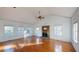 Spacious living room with hardwood floors and fireplace at 791 Cross Plains Hulett Rd, Carrollton, GA 30116
