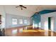 Large living room with hardwood floors and vaulted ceiling at 791 Cross Plains Hulett Rd, Carrollton, GA 30116