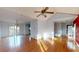 Open concept living and dining area with hardwood floors at 791 Cross Plains Hulett Rd, Carrollton, GA 30116