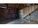Unfinished basement area with exposed walls and flooring at 791 Cross Plains Hulett Rd, Carrollton, GA 30116
