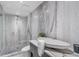Elegant bathroom with marble walls, a walk-in shower, and a unique vessel sink at 4070 Whitewater Creek Nw Rd, Atlanta, GA 30327