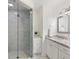Modern bathroom showcases a glass shower and vanity with granite countertop at 4070 Whitewater Creek Nw Rd, Atlanta, GA 30327