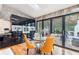 Dining area flows into the kitchen with access to the outdoor living space with great natural lighting at 4070 Whitewater Creek Nw Rd, Atlanta, GA 30327