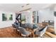 Dining room area with view of staircase, modern table, and stylish chairs at 4070 Whitewater Creek Nw Rd, Atlanta, GA 30327