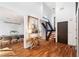 Elegant entryway with hardwood floors, designer decor, and a glimpse of the modern staircase at 4070 Whitewater Creek Nw Rd, Atlanta, GA 30327