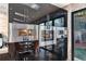 Modern kitchen features stainless steel ovens, black cabinets, and marble accents at 4070 Whitewater Creek Nw Rd, Atlanta, GA 30327